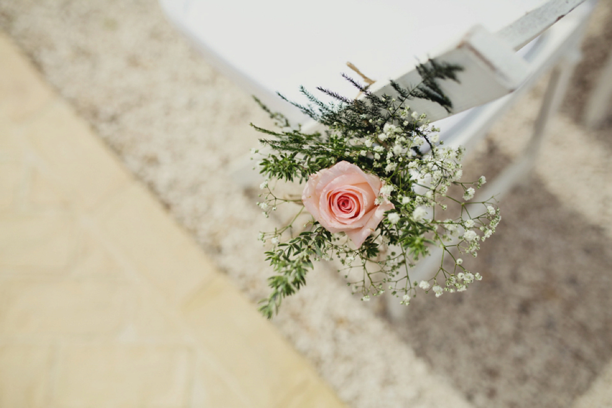 The bride wore Nicole by Jenny Packham for her intimate and relaxed wedding in Spain. Photography by Lisa Jane.