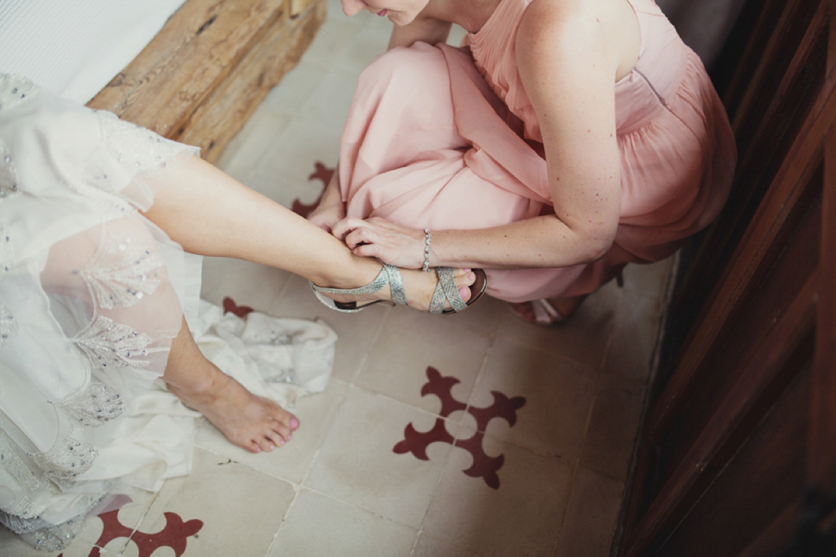 The bride wore Nicole by Jenny Packham for her intimate and relaxed wedding in Spain. Photography by Lisa Jane.
