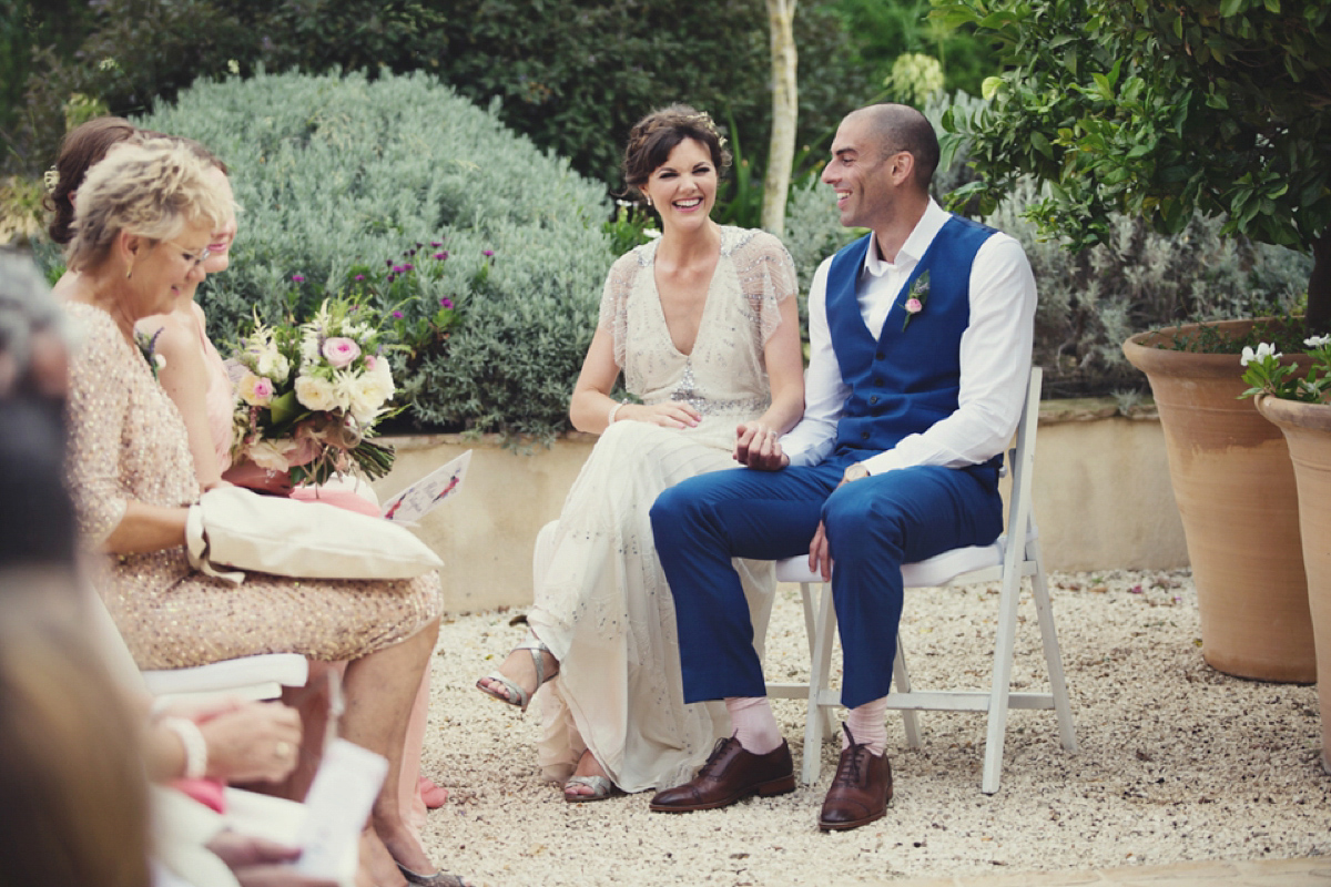 The bride wore Nicole by Jenny Packham for her intimate and relaxed wedding in Spain. Photography by Lisa Jane.