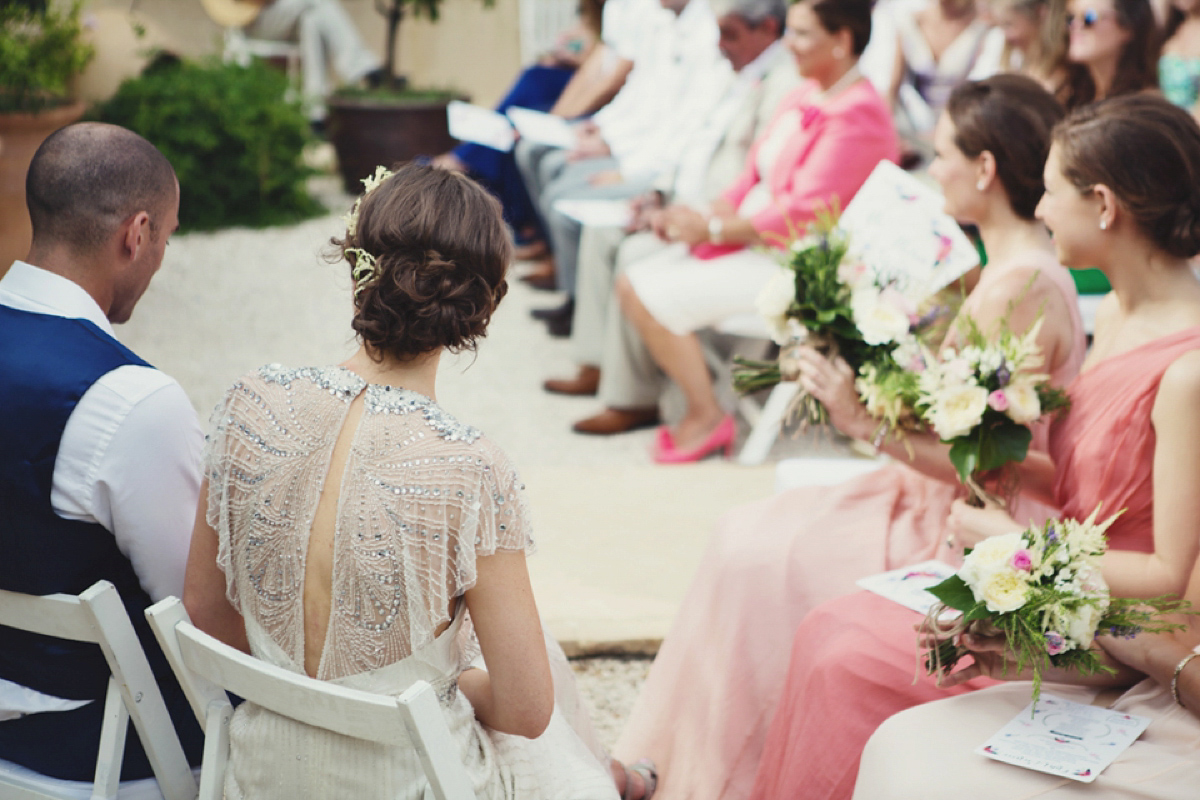 The bride wore Nicole by Jenny Packham for her intimate and relaxed wedding in Spain. Photography by Lisa Jane.