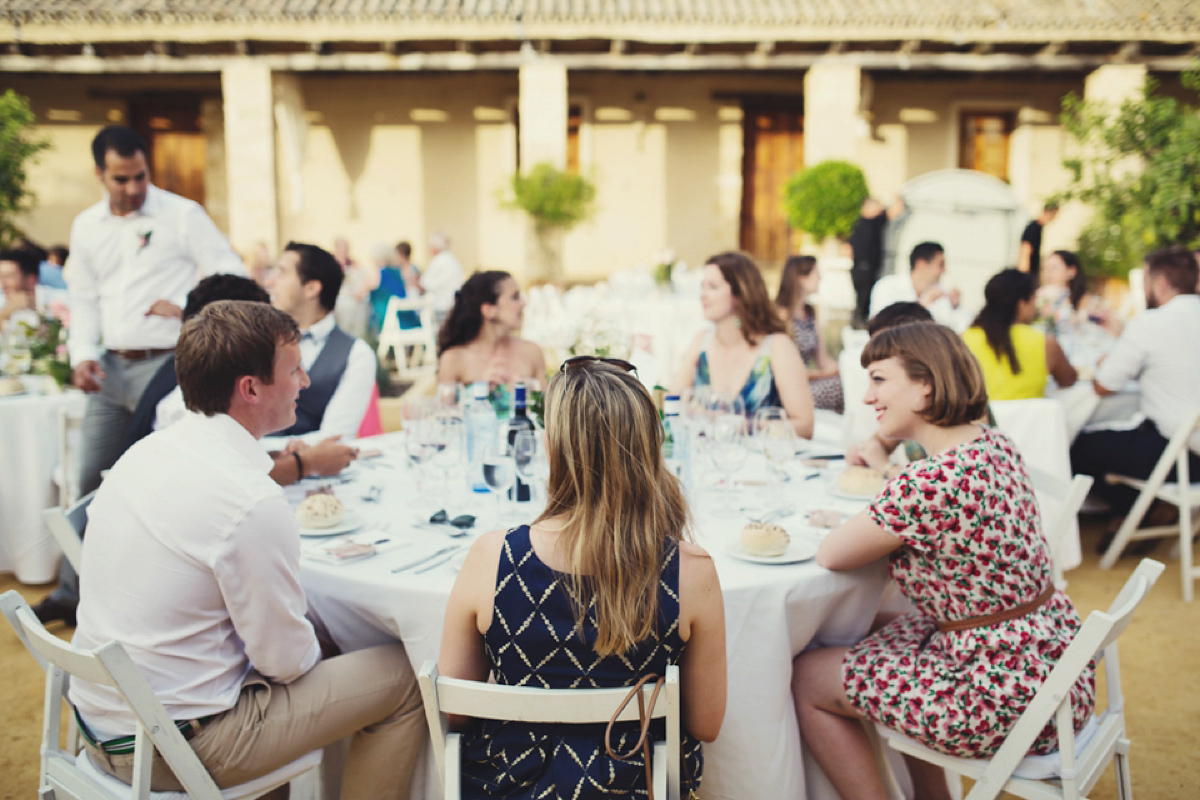 The bride wore Nicole by Jenny Packham for her intimate and relaxed wedding in Spain. Photography by Lisa Jane.