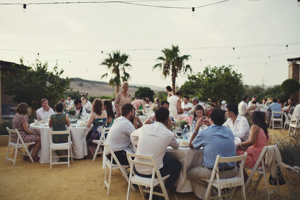 The bride wore Nicole by Jenny Packham for her intimate and relaxed wedding in Spain. Photography by Lisa Jane.