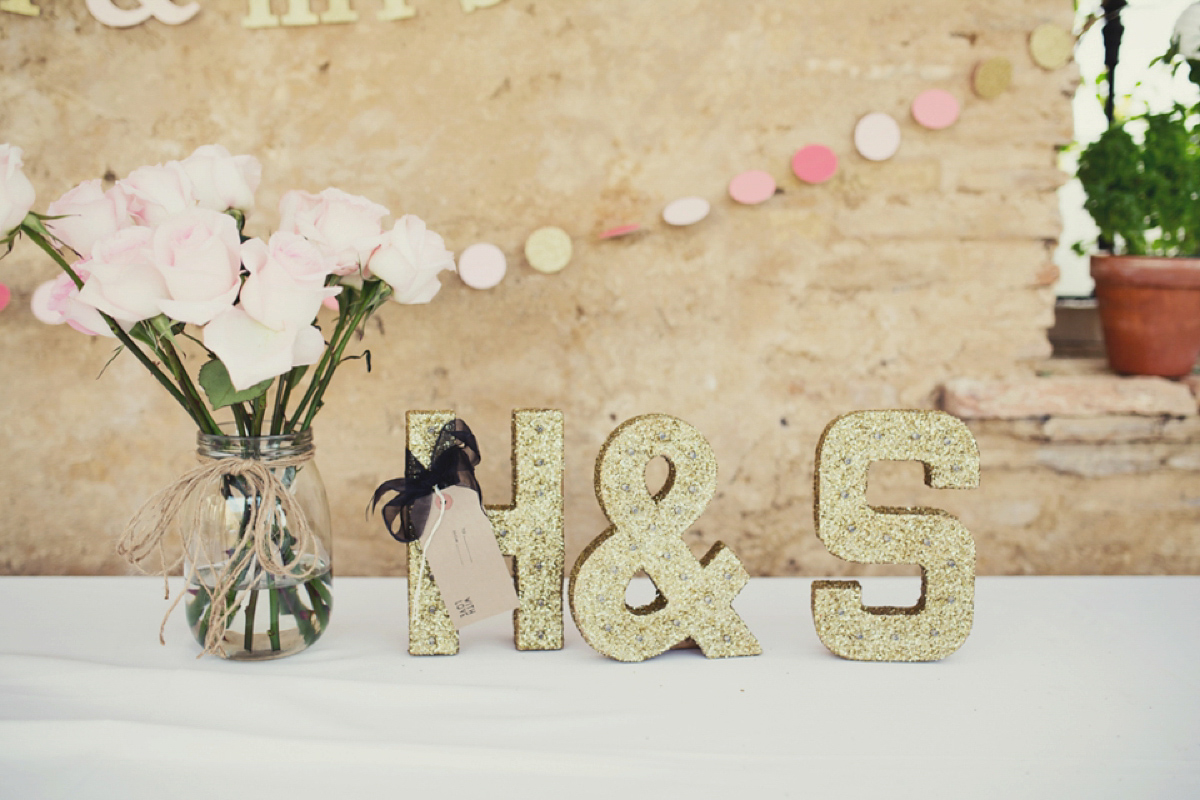 The bride wore Nicole by Jenny Packham for her intimate and relaxed wedding in Spain. Photography by Lisa Jane.