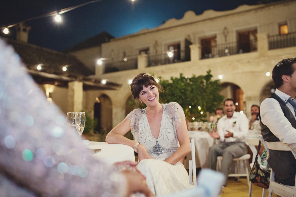 The bride wore Nicole by Jenny Packham for her intimate and relaxed wedding in Spain. Photography by Lisa Jane.