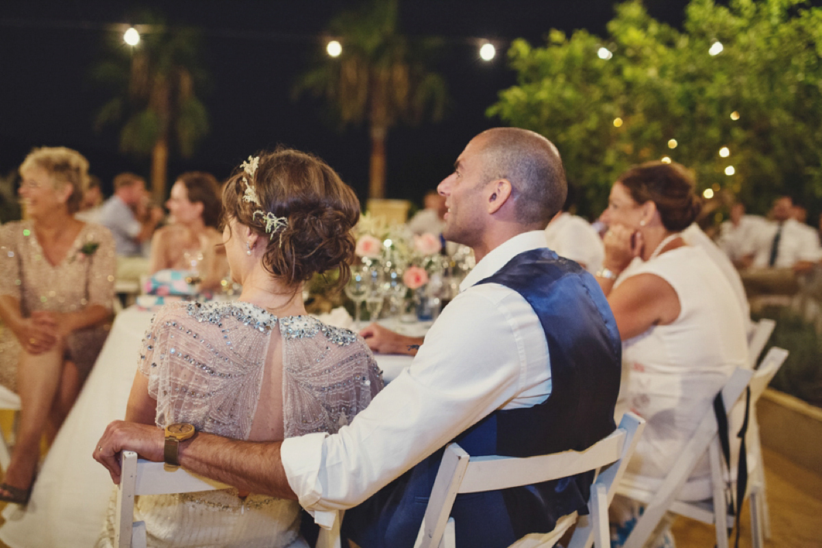 The bride wore Nicole by Jenny Packham for her intimate and relaxed wedding in Spain. Photography by Lisa Jane.