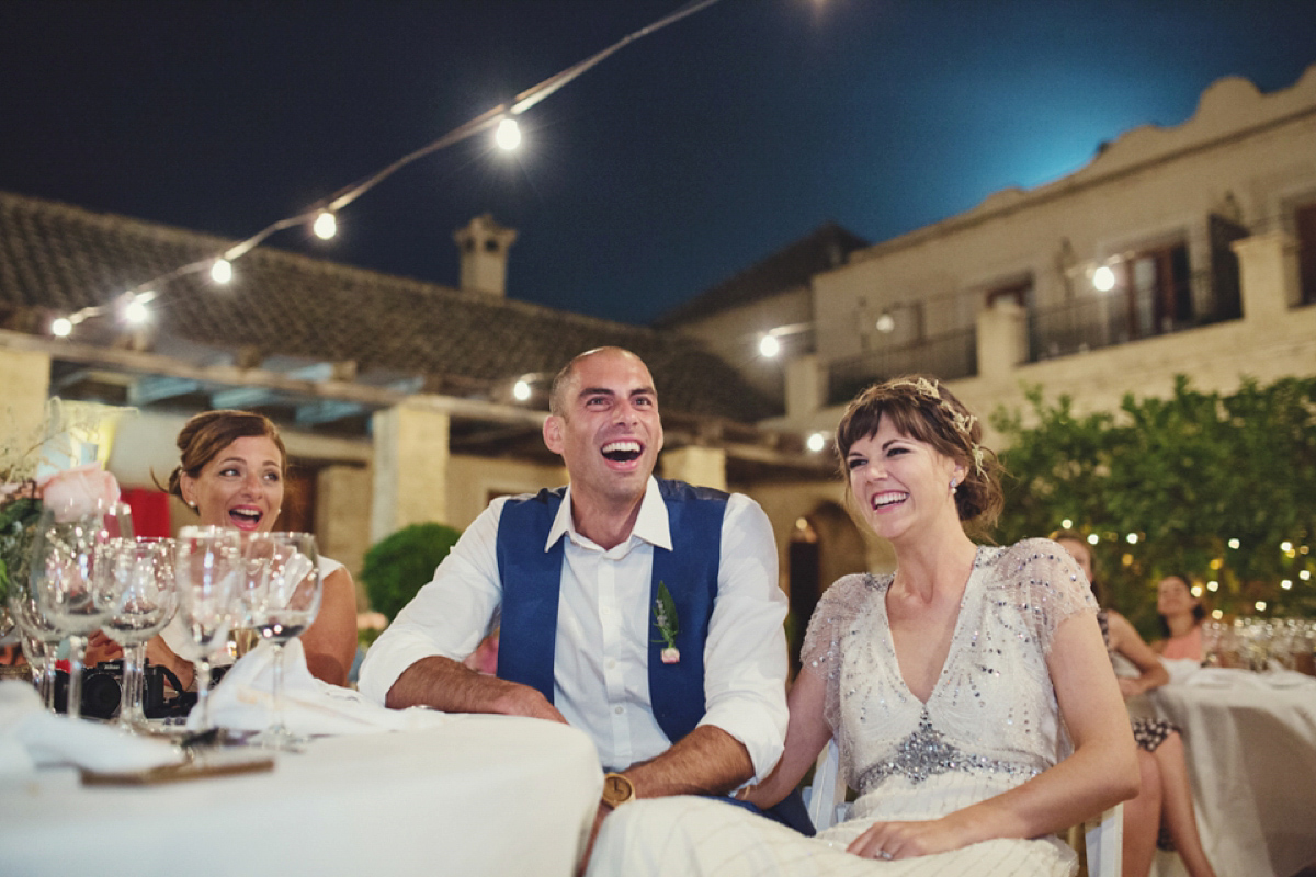 The bride wore Nicole by Jenny Packham for her intimate and relaxed wedding in Spain. Photography by Lisa Jane.