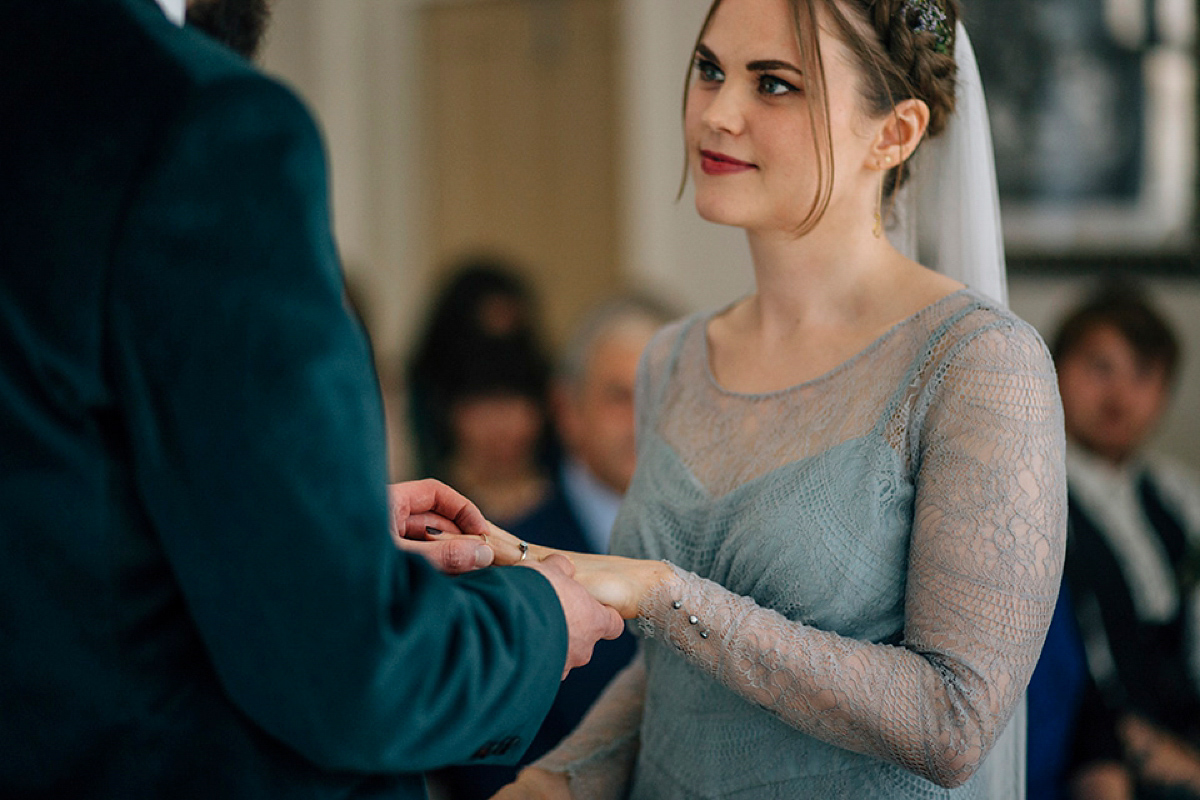 A pale green dress and first look for a feminist wedding in Yorkshire. Dress by Kate Beaumont, images by Kindred Photography.