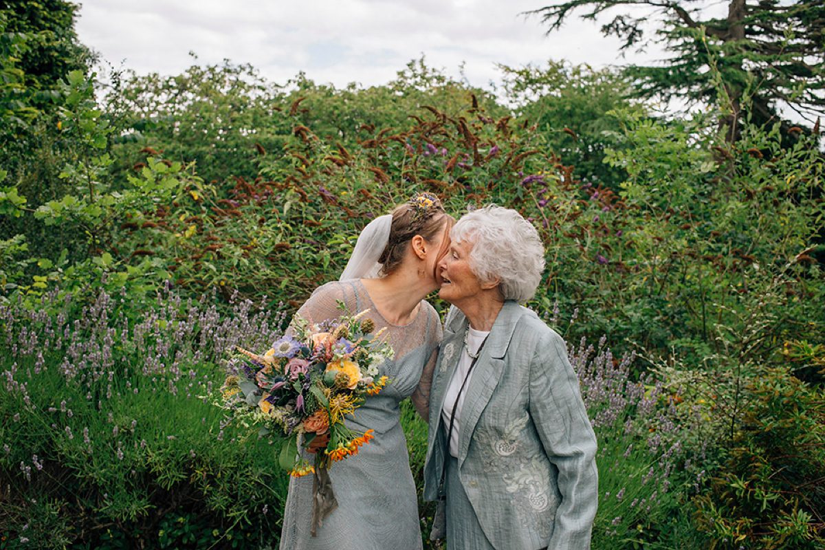 A pale green dress and first look for a feminist wedding in Yorkshire. Dress by Kate Beaumont, images by Kindred Photography.