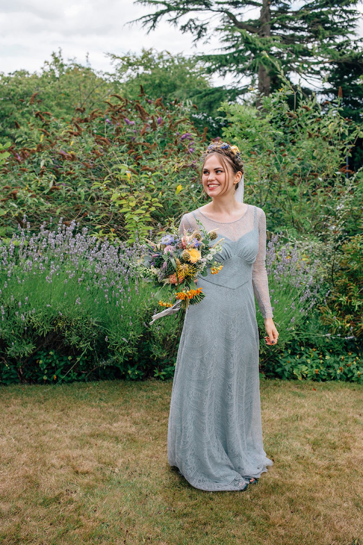 A pale green dress and first look for a feminist wedding in Yorkshire. Dress by Kate Beaumont, images by Kindred Photography.