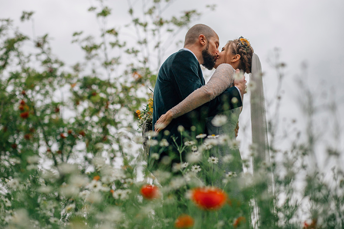 A pale green dress and first look for a feminist wedding in Yorkshire. Dress by Kate Beaumont, images by Kindred Photography.