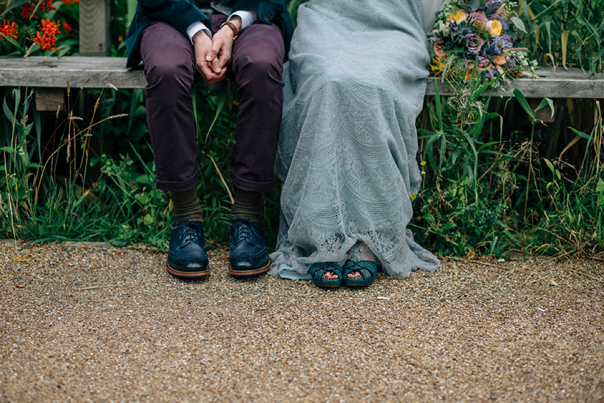 A pale green dress and first look for a feminist wedding in Yorkshire. Dress by Kate Beaumont, images by Kindred Photography.