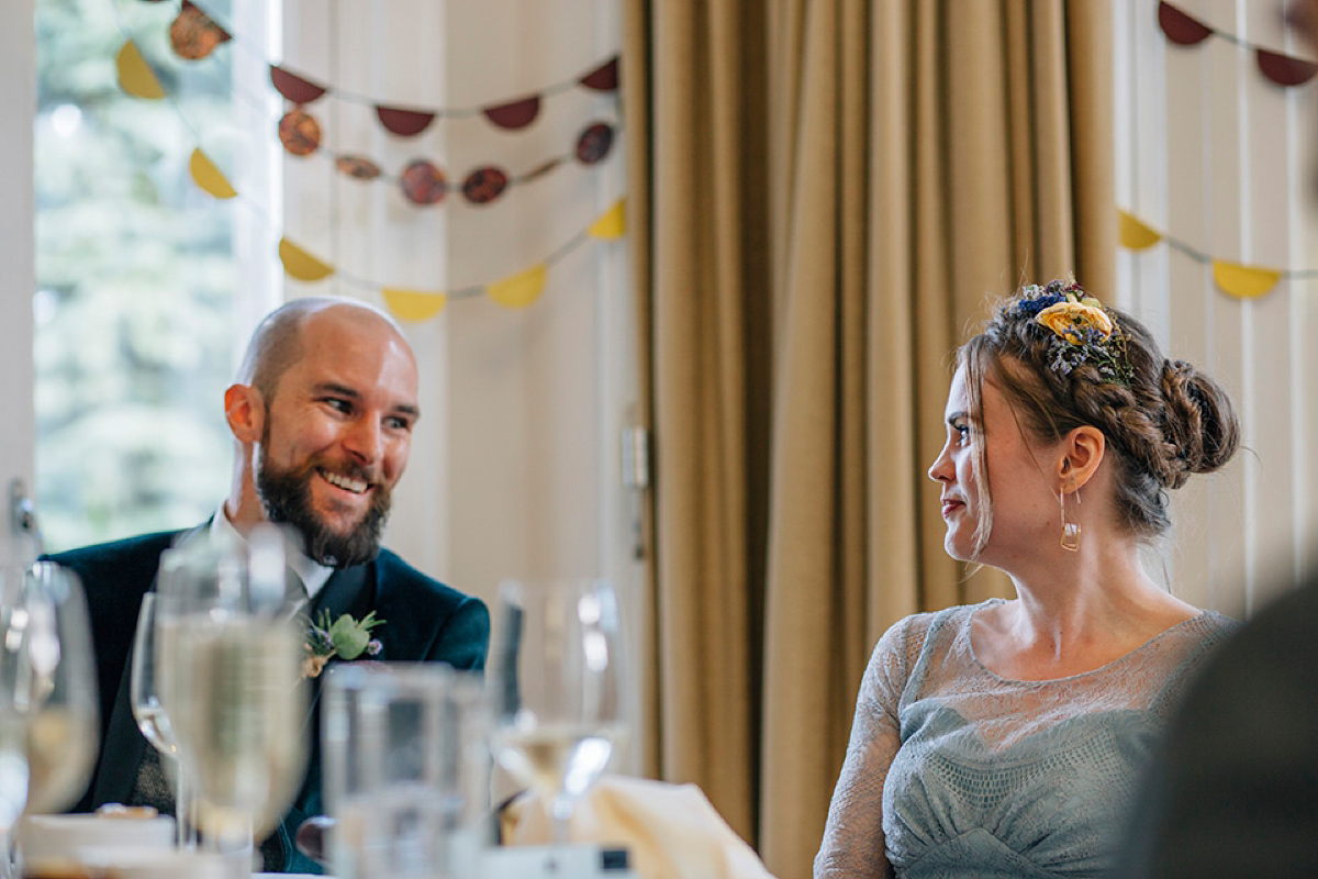 A pale green dress and first look for a feminist wedding in Yorkshire. Dress by Kate Beaumont, images by Kindred Photography.