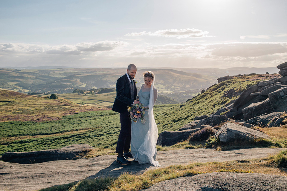 A pale green dress and first look for a feminist wedding in Yorkshire. Dress by Kate Beaumont, images by Kindred Photography.