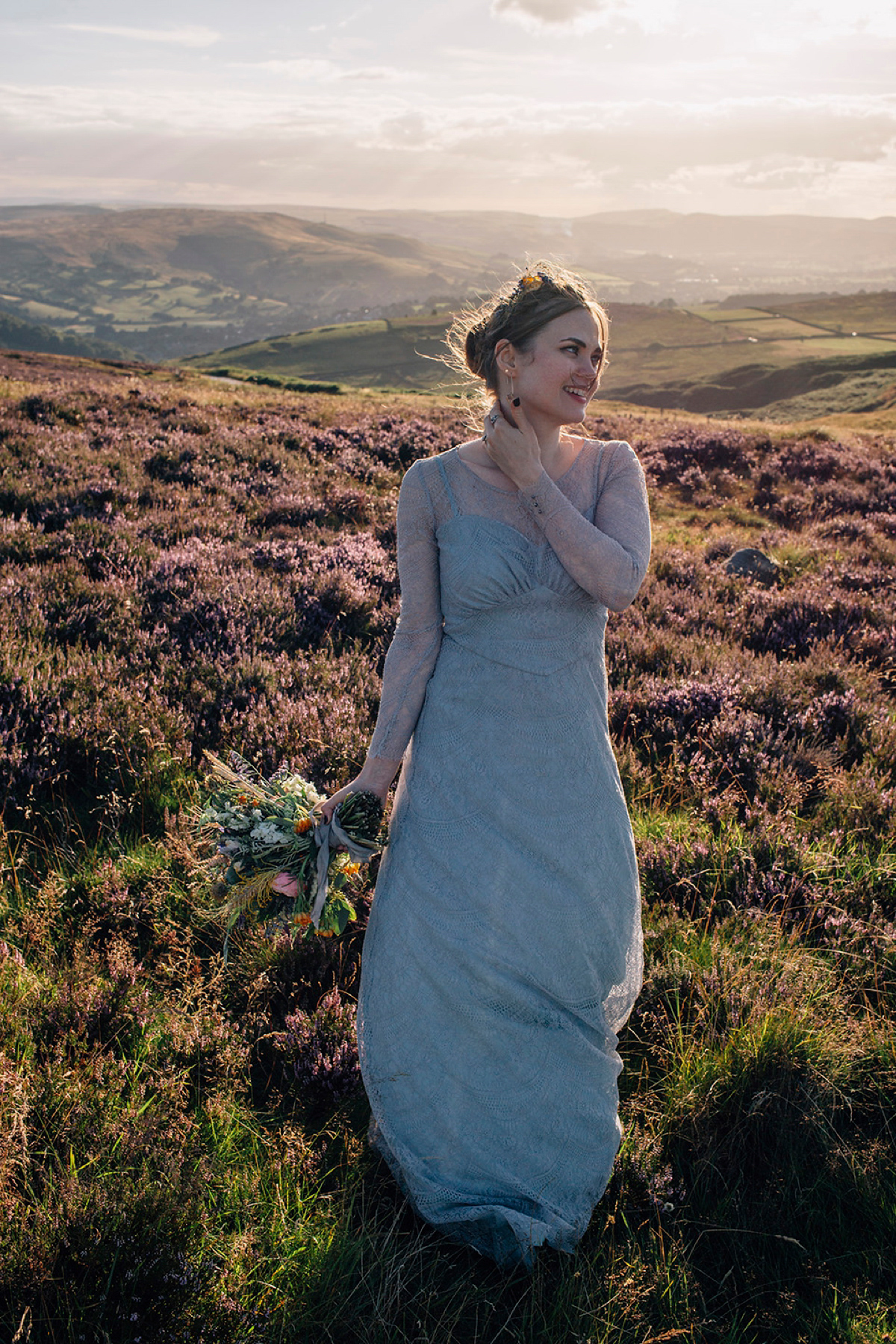 A pale green dress and first look for a feminist wedding in Yorkshire. Dress by Kate Beaumont, images by Kindred Photography.