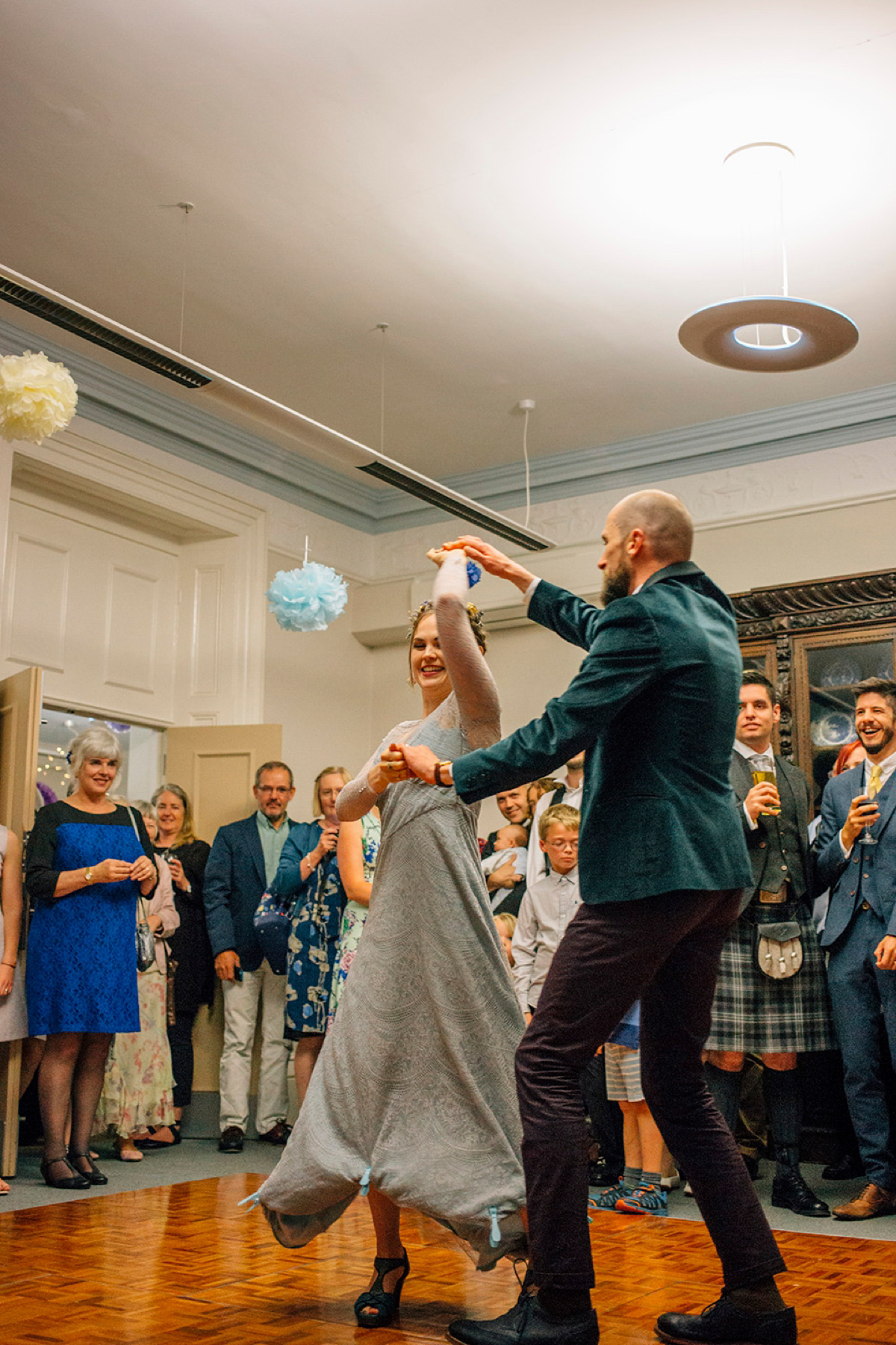 A pale green dress and first look for a feminist wedding in Yorkshire. Dress by Kate Beaumont, images by Kindred Photography.