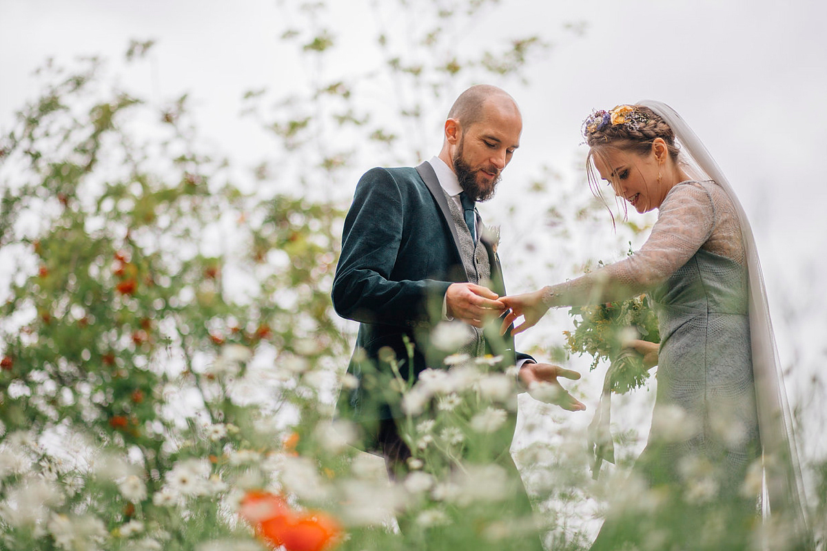 A pale green dress and first look for a feminist wedding in Yorkshire. Dress by Kate Beaumont, images by Kindred Photography.