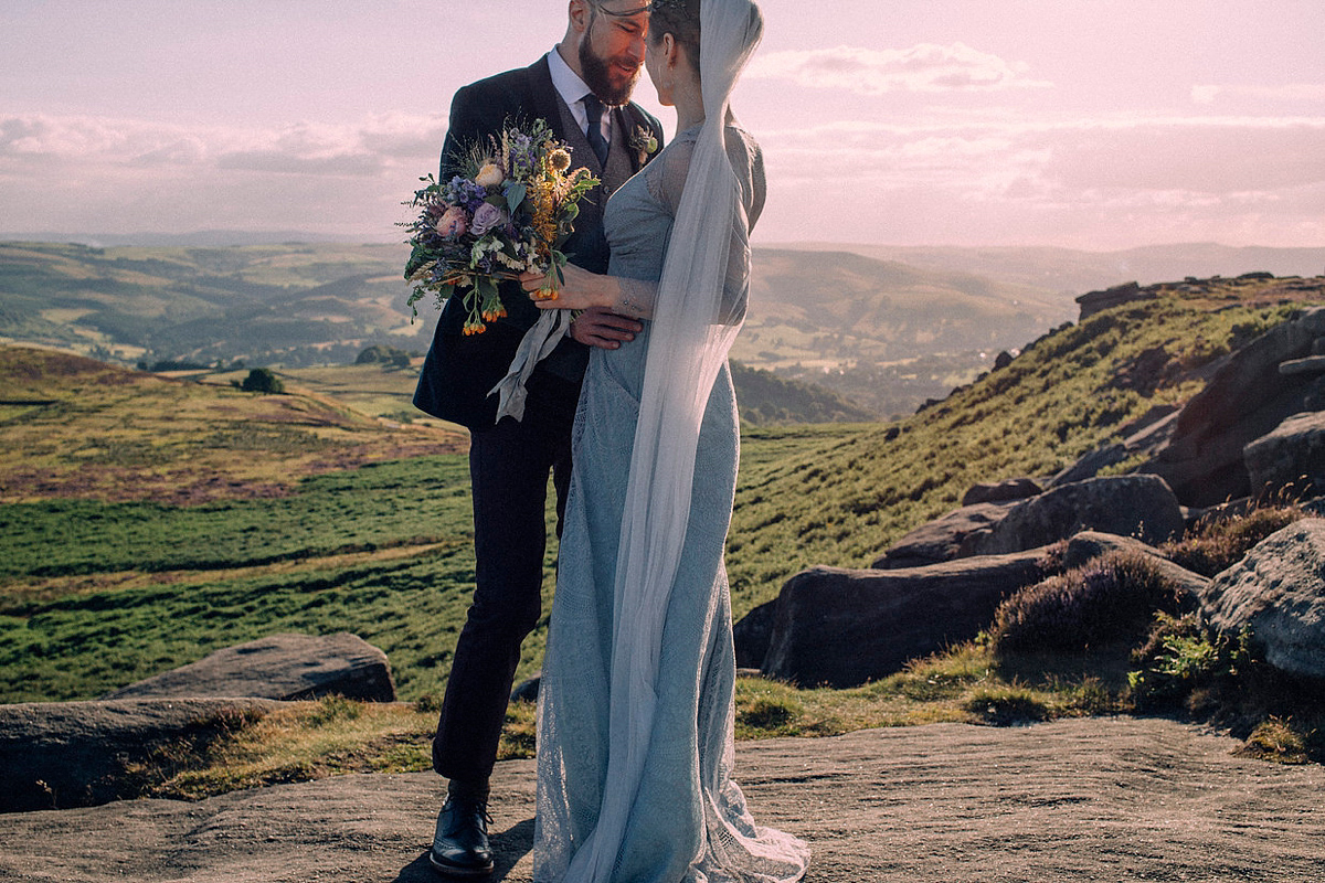 A pale green dress and first look for a feminist wedding in Yorkshire. Dress by Kate Beaumont, images by Kindred Photography.