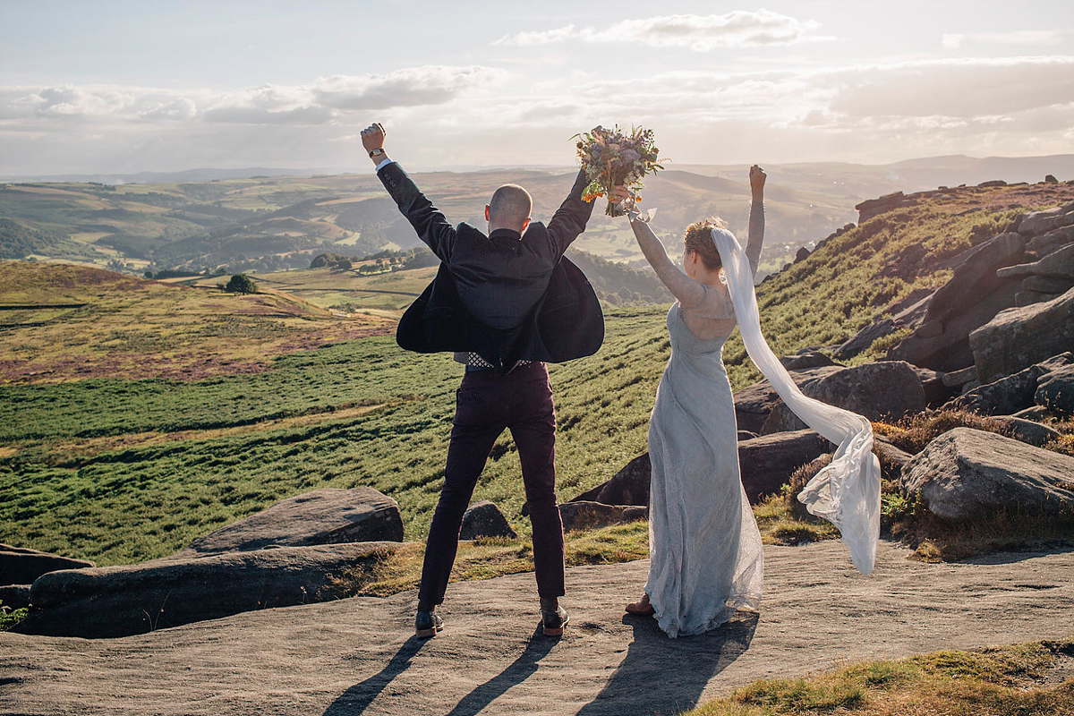 A pale green dress and first look for a feminist wedding in Yorkshire. Dress by Kate Beaumont, images by Kindred Photography.