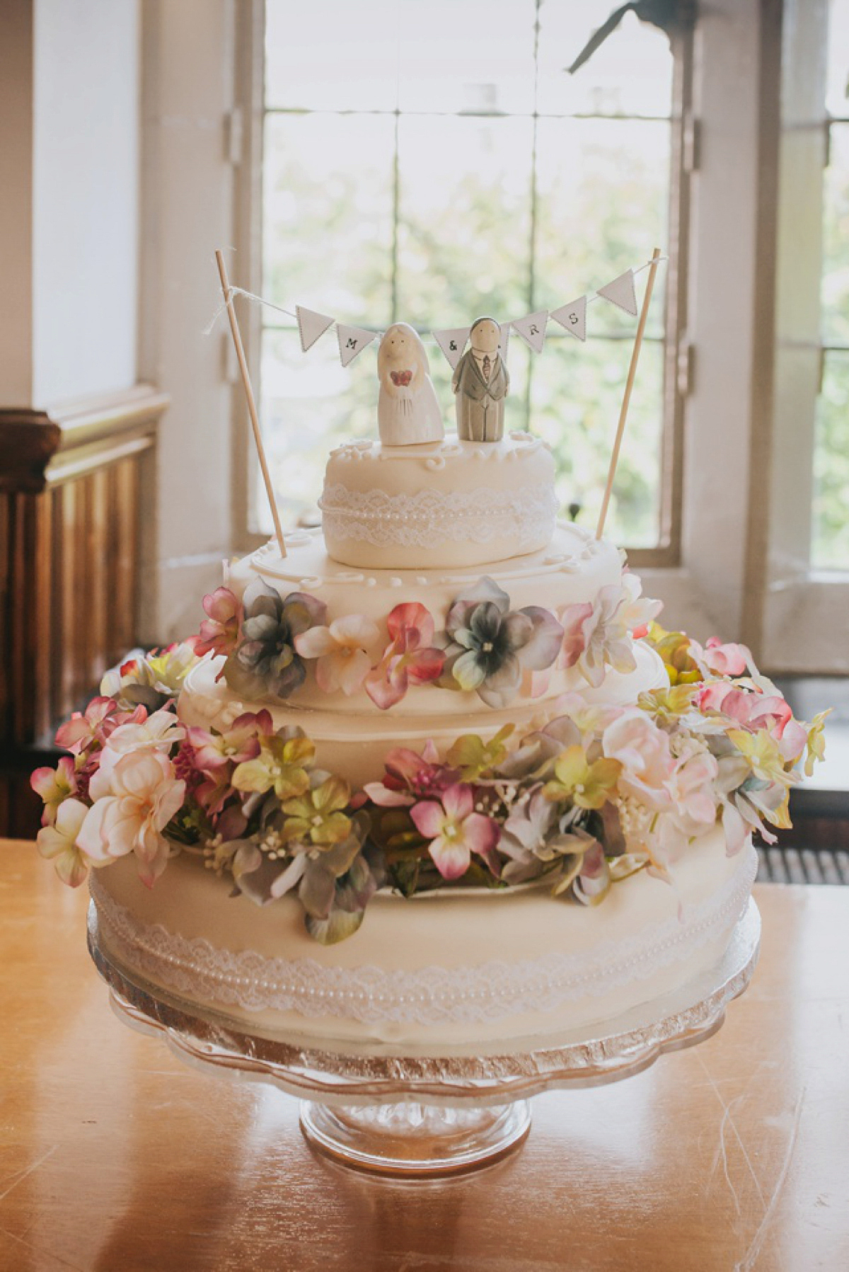 A Juliet cap veil and red lipstick for a quirky vintage wedding in Liverpool. Photography by Becky Ryan.