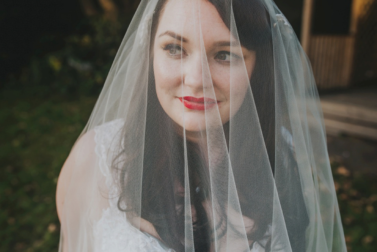 A Juliet cap veil and red lipstick for a quirky vintage wedding in Liverpool. Photography by Becky Ryan.