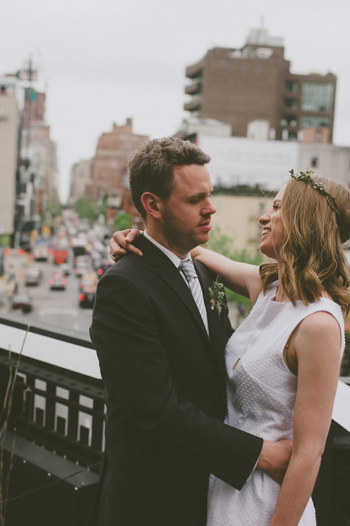 The bride wears a short dress she made herself for her intimate New York city wedding. Photography by Nabeel Khan.