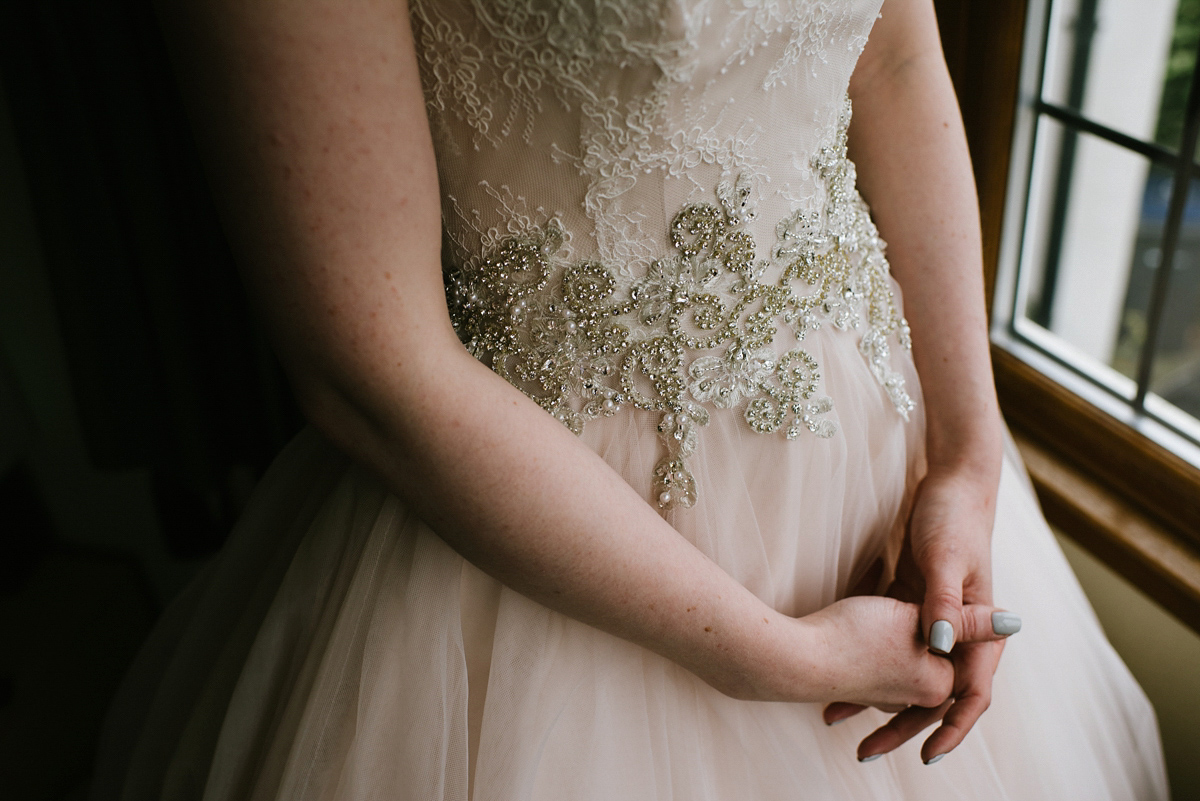 Jade wore a leather jacket with her Allure Bridals gown. Photography by Ed Godden.