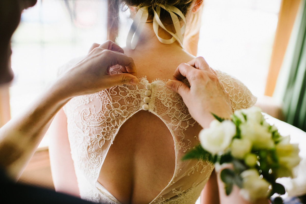 Jade wore a leather jacket with her Allure Bridals gown. Photography by Ed Godden.