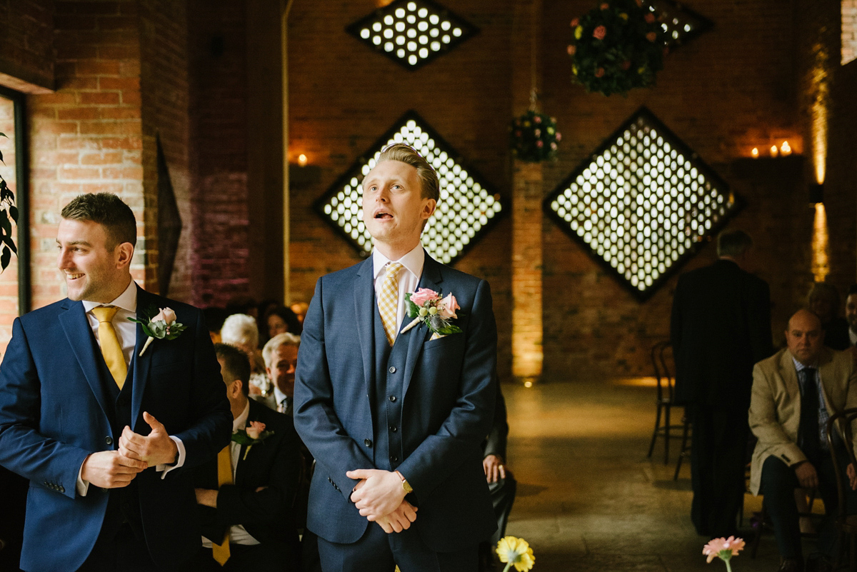 Jade wore a leather jacket with her Allure Bridals gown. Photography by Ed Godden.