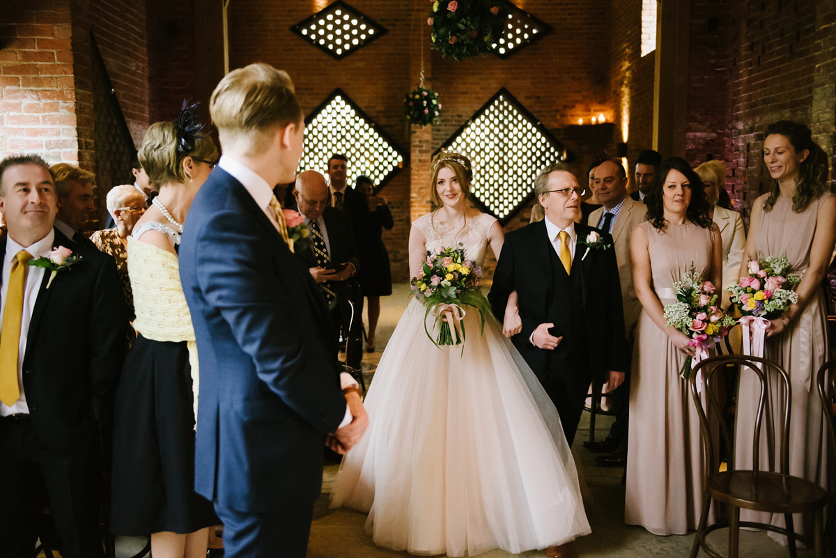 Jade wore a leather jacket with her Allure Bridals gown. Photography by Ed Godden.