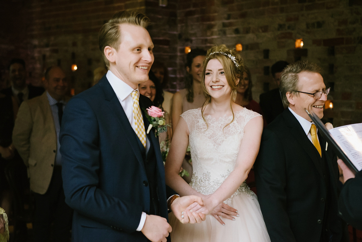 Jade wore a leather jacket with her Allure Bridals gown. Photography by Ed Godden.