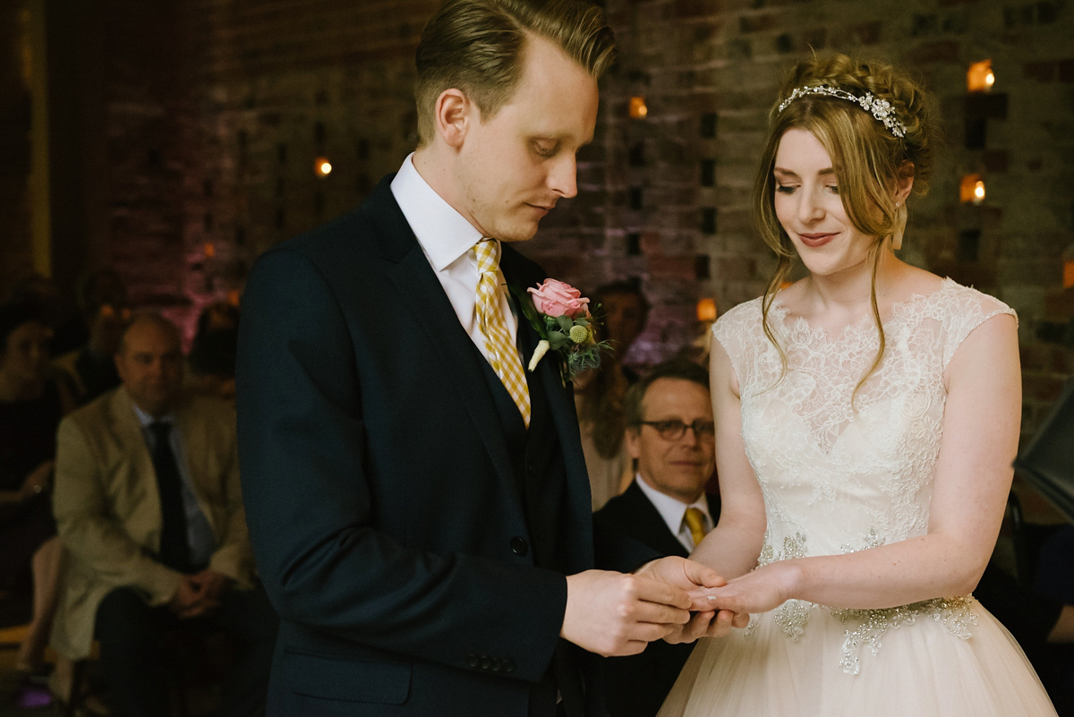 Jade wore a leather jacket with her Allure Bridals gown. Photography by Ed Godden.