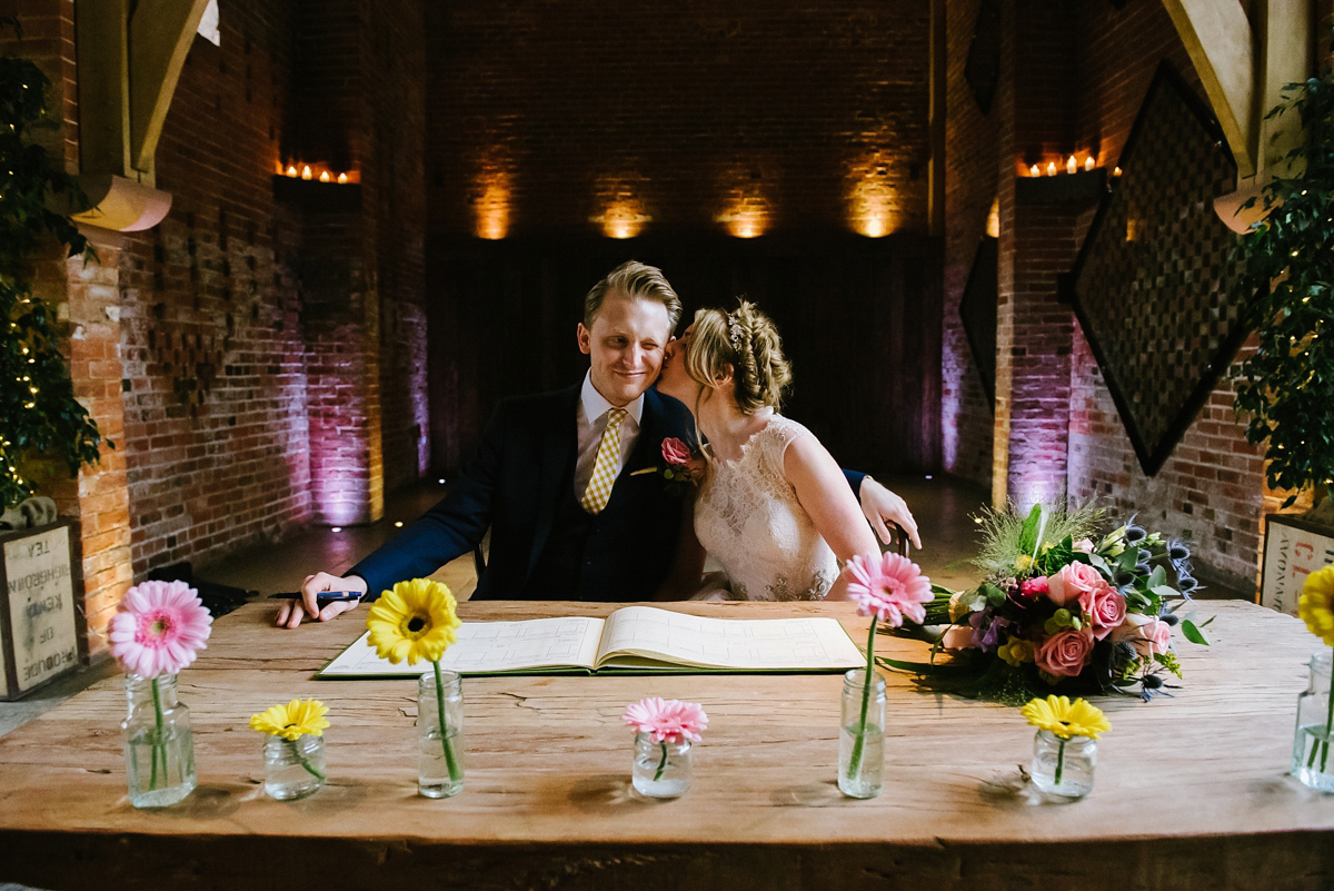 Jade wore a leather jacket with her Allure Bridals gown. Photography by Ed Godden.