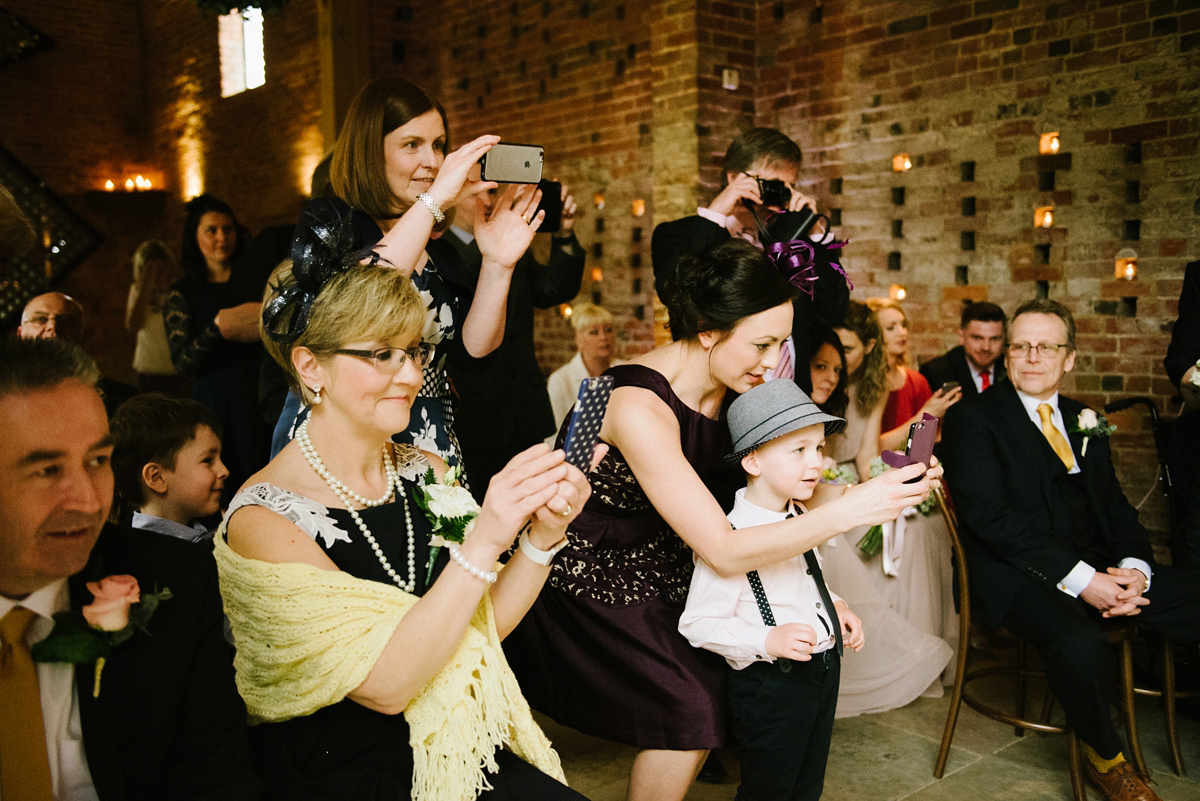 Jade wore a leather jacket with her Allure Bridals gown. Photography by Ed Godden.