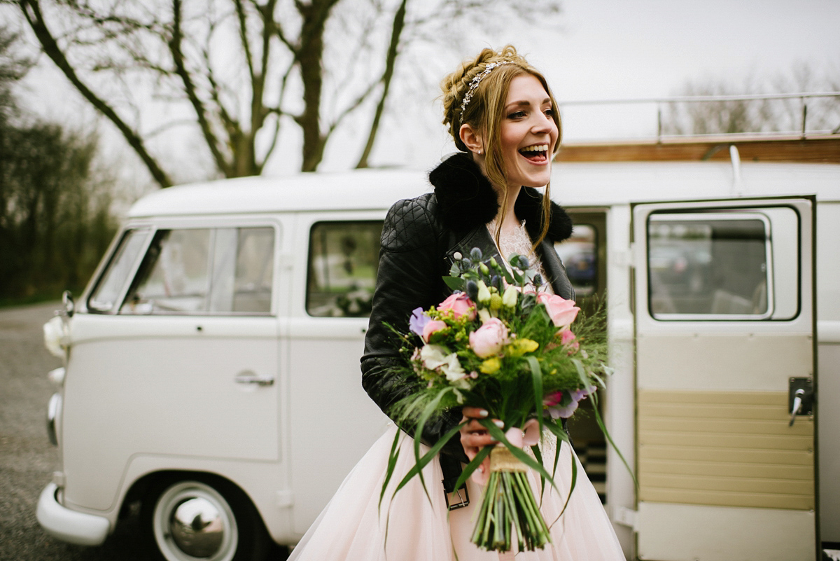 Jade wore a leather jacket with her Allure Bridals gown. Photography by Ed Godden.