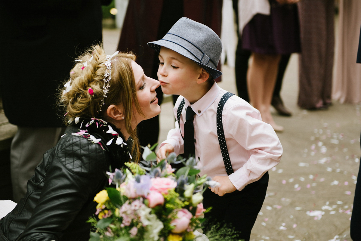 Jade wore a leather jacket with her Allure Bridals gown. Photography by Ed Godden.