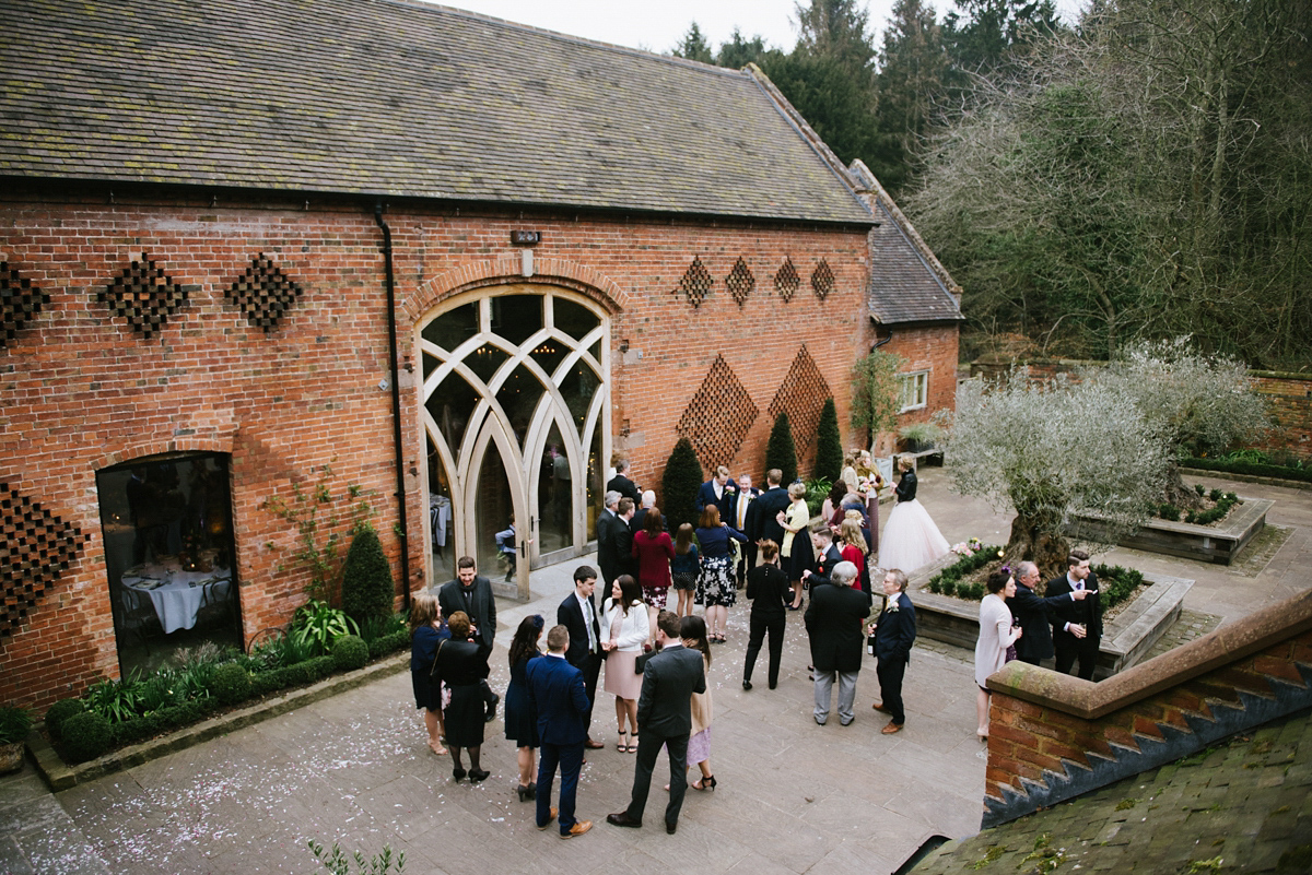 Jade wore a leather jacket with her Allure Bridals gown. Photography by Ed Godden.