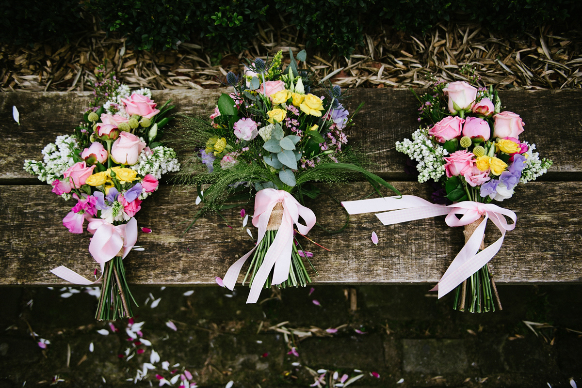 Jade wore a leather jacket with her Allure Bridals gown. Photography by Ed Godden.