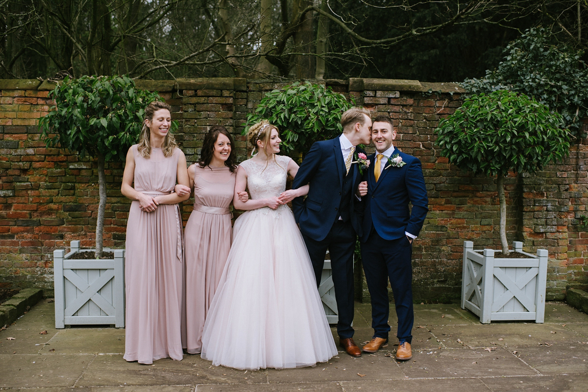 Jade wore a leather jacket with her Allure Bridals gown. Photography by Ed Godden.