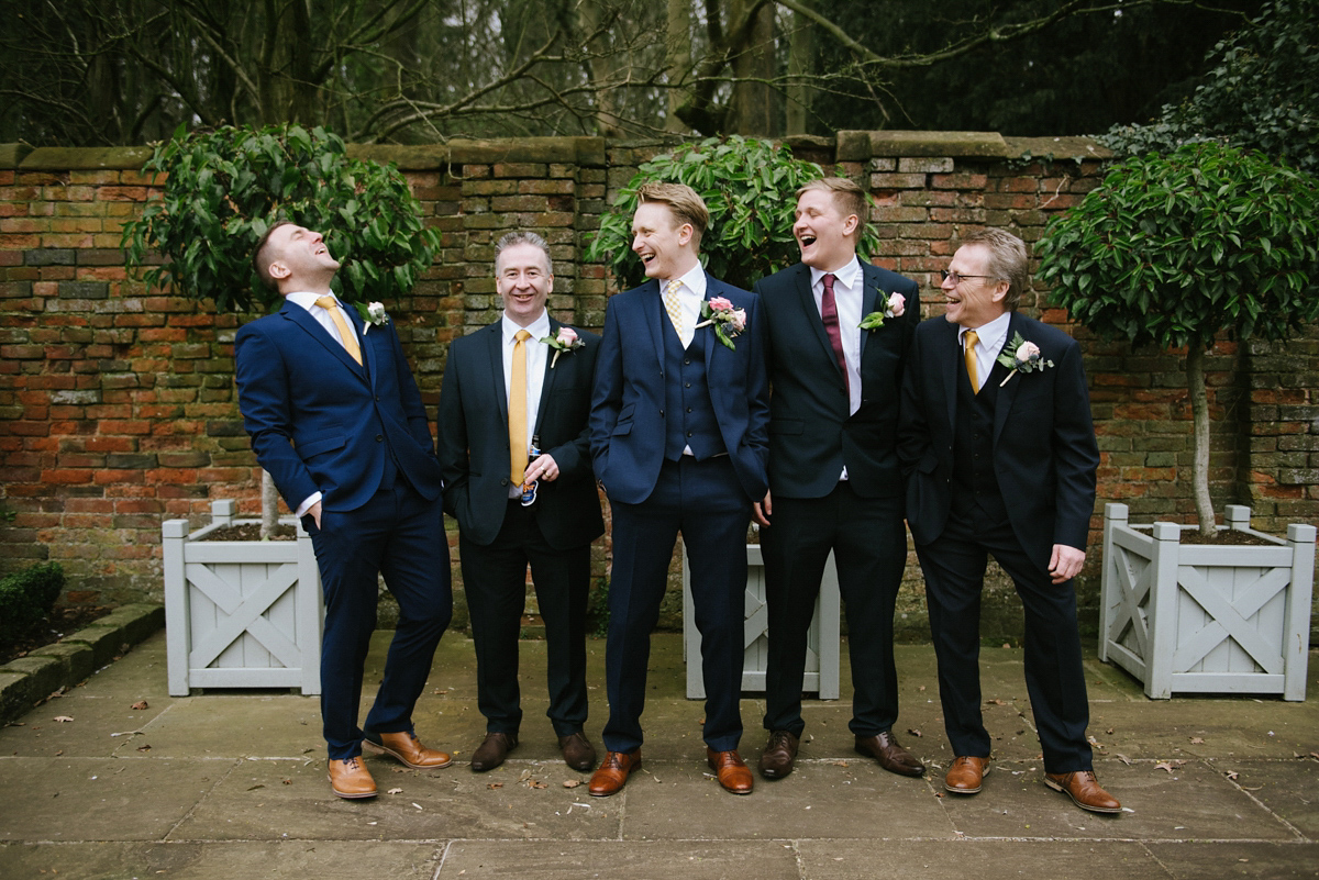 Jade wore a leather jacket with her Allure Bridals gown. Photography by Ed Godden.