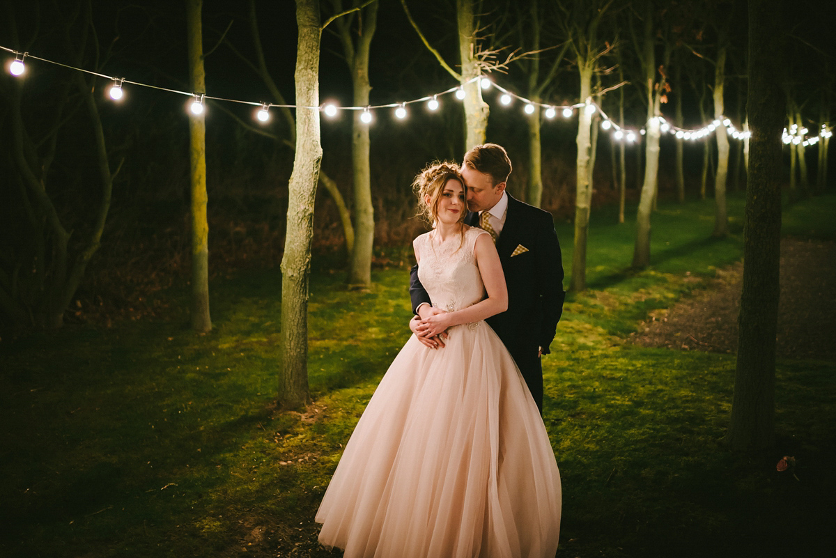 Jade wore a leather jacket with her Allure Bridals gown. Photography by Ed Godden.