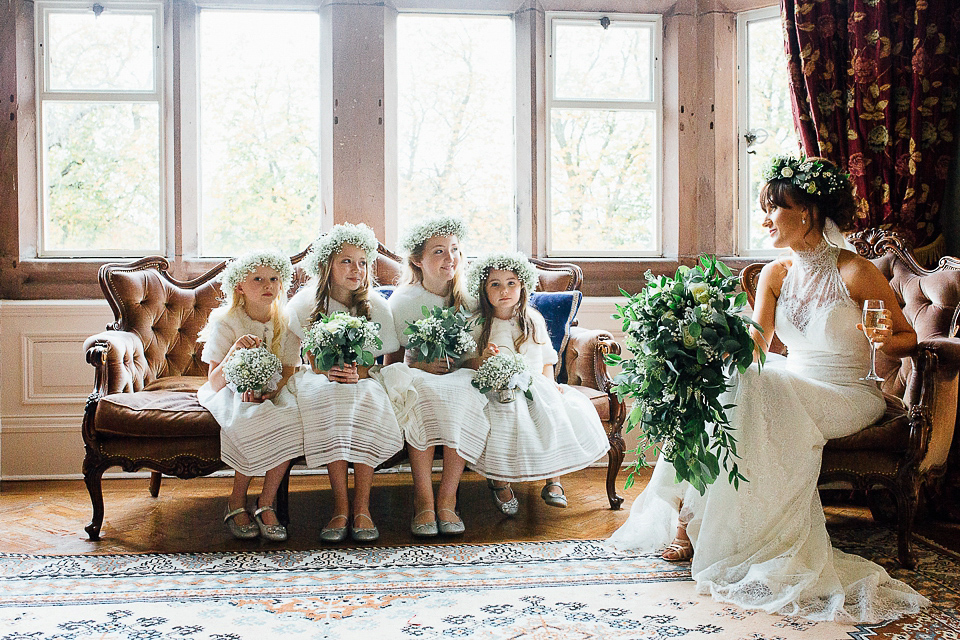 Jill wears an Essense of Australia gown for her Autumn wedding at Ellingham Hall in Northumberland. Photography by Helen Russell.