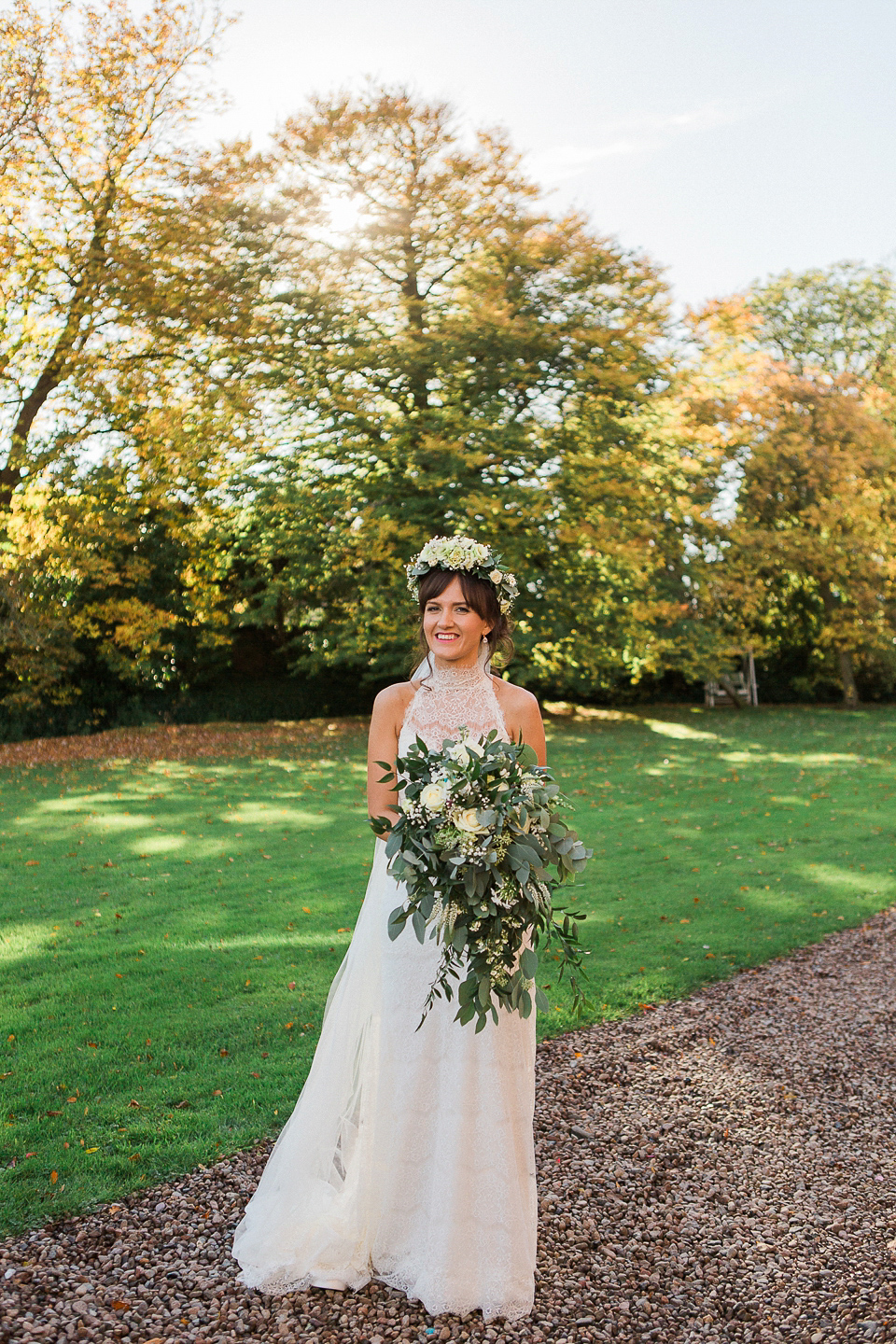 Jill wears an Essense of Australia gown for her Autumn wedding at Ellingham Hall in Northumberland. Photography by Helen Russell.