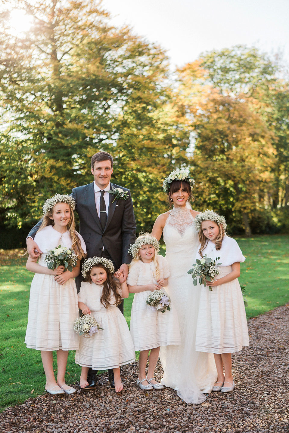 Jill wears an Essense of Australia gown for her Autumn wedding at Ellingham Hall in Northumberland. Photography by Helen Russell.