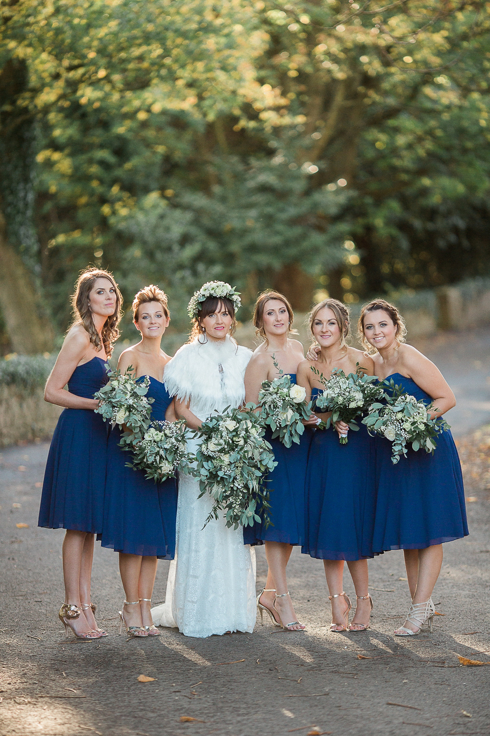 Jill wears an Essense of Australia gown for her Autumn wedding at Ellingham Hall in Northumberland. Photography by Helen Russell.