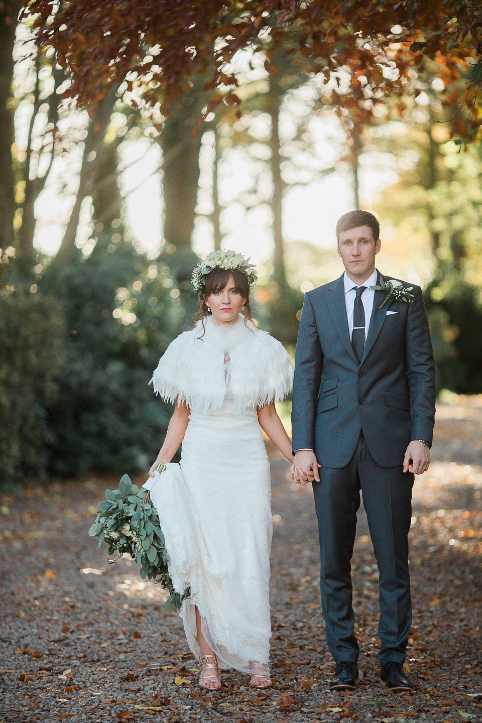 Jill wears an Essense of Australia gown for her Autumn wedding at Ellingham Hall in Northumberland. Photography by Helen Russell.