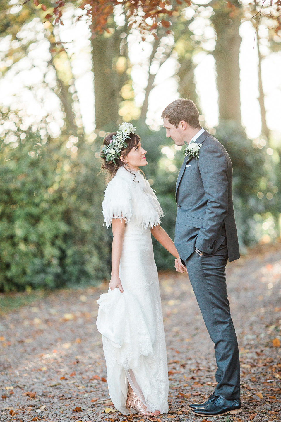 Jill wears an Essense of Australia gown for her Autumn wedding at Ellingham Hall in Northumberland. Photography by Helen Russell.