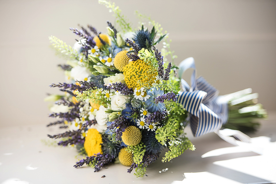 A pretty pale blue wedding dress for a nautical inspired Summer wedding by the sea. Photography by Alexandria Hall.