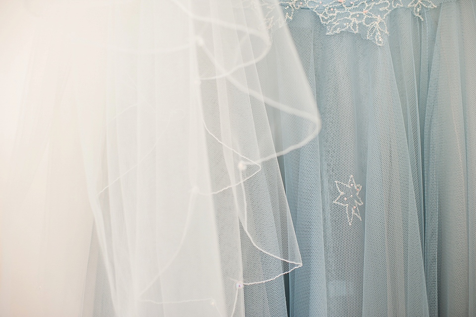 A pretty pale blue wedding dress for a nautical inspired Summer wedding by the sea. Photography by Alexandria Hall.