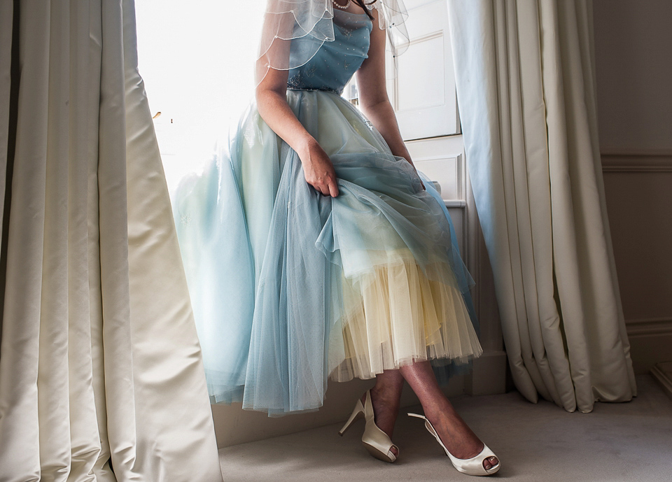 A pretty pale blue wedding dress for a nautical inspired Summer wedding by the sea. Photography by Alexandria Hall.