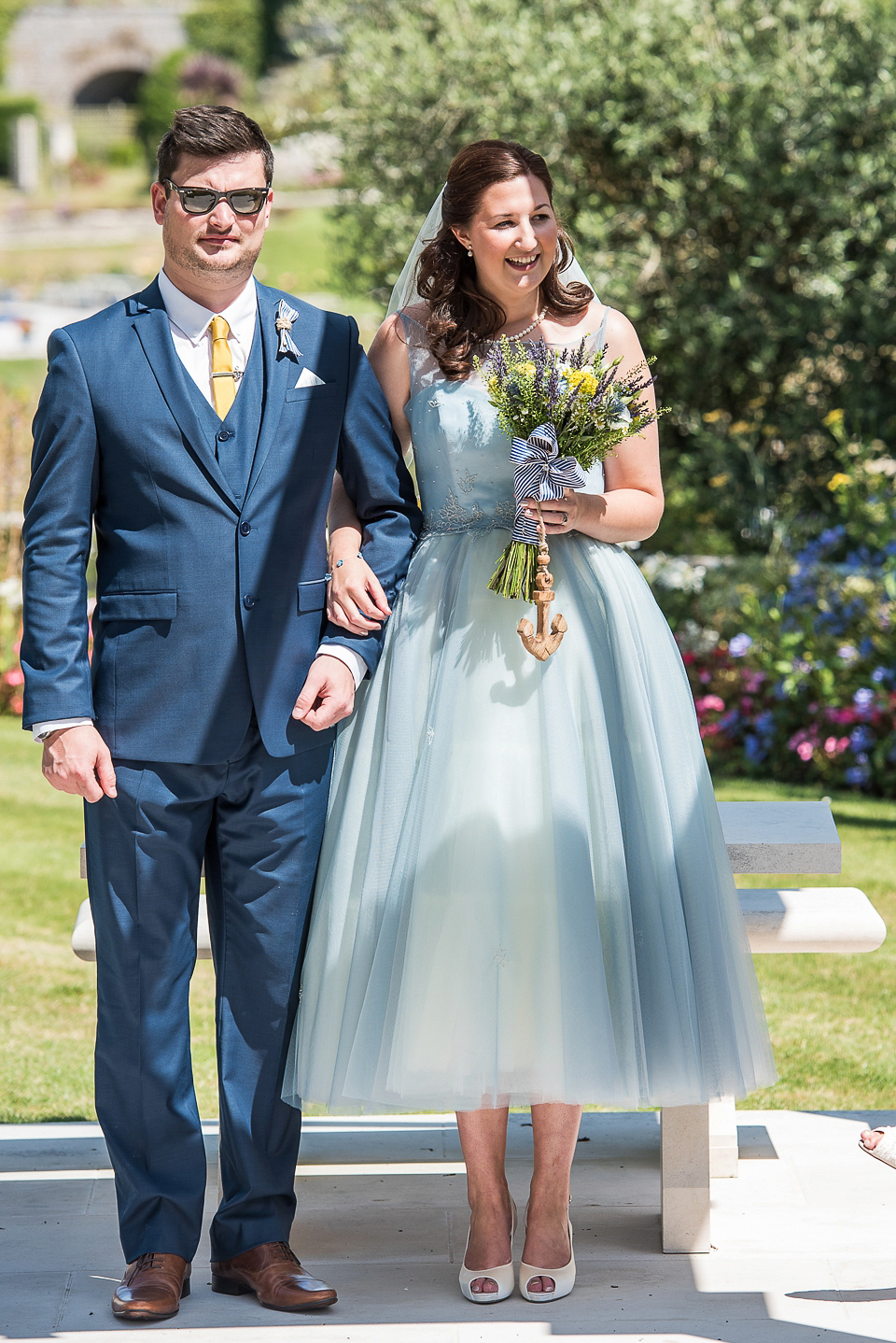 A pretty pale blue wedding dress for a nautical inspired Summer wedding by the sea. Photography by Alexandria Hall.